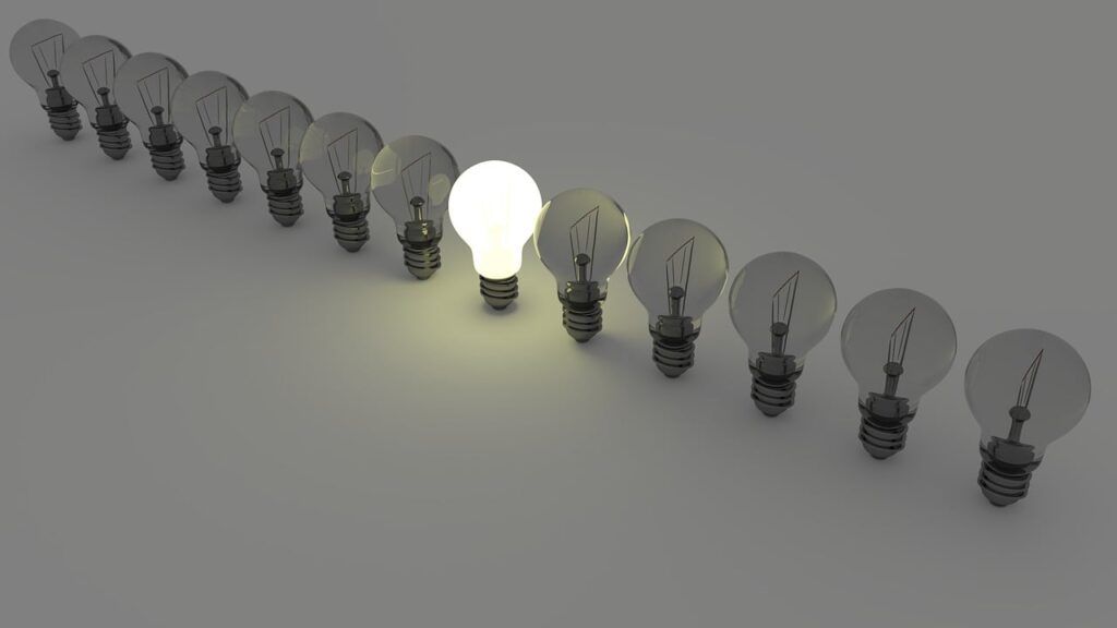 What Is The Best Online Business to Start Today - a row of lightbulbs with the middle one illuminated