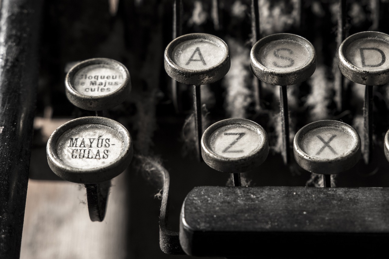 How To Make Money by Writing Online - Classic Typewriter keys in black and white