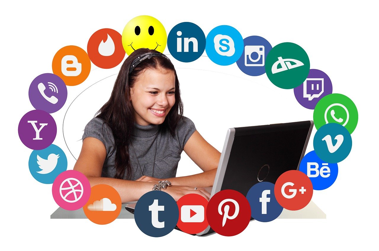 How to Become a Social Media Influencer. Social Media Icons creating a circle around a Female on a Laptop