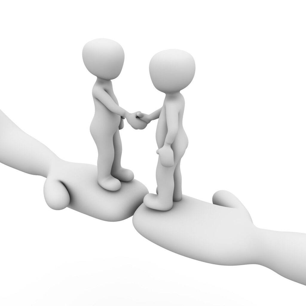 Cartoon Image of Two individuals. Each One is standing on an outstretched hand. The individuals are shaking hands with each other